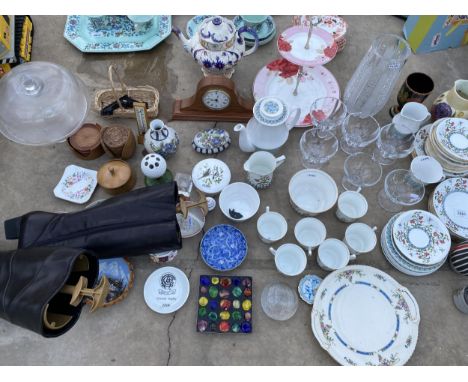 A LARGE ASSORTMENT OF CERAMICS AND GLASS WARE TO INCLUDE PLATES, SAUCERS AND VASES ETC