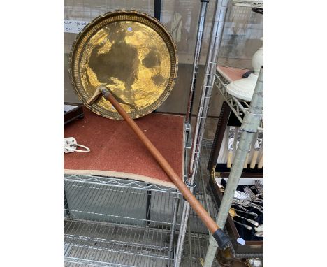 A LARGE BRASS WALL CHARGER AND A WALKING STICK WITH HALLMARKED SILVER COLLAR