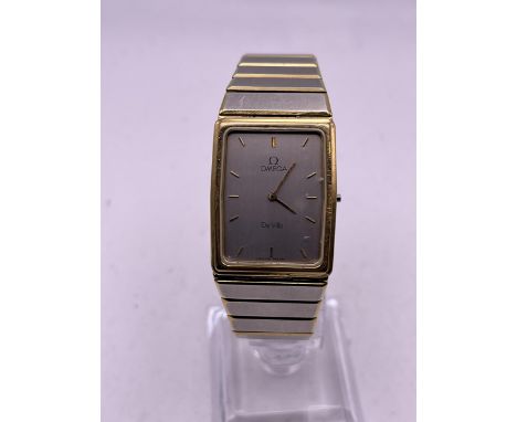 A RARE VINTAGE TANK OMEGA DE VILLE CAL.1455 24MM QUARTZ GOLD AND STEEL WITH ROMAN DIAL MENS WRISTWATCH. MISSING CROWN WINDER