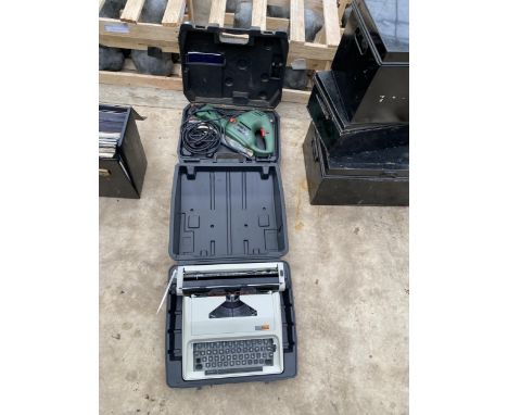 A PARKSIDE RECIPRICATING SAW AND A SCOTTS OF STOW TYPEWRITER IN CARRY CASE