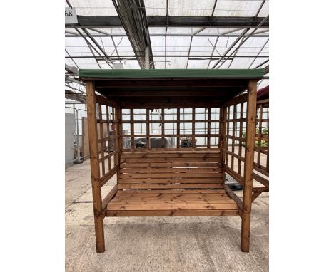 AN AS NEW EX DISPLAY CHARLES TAYLOR FURNITURE SET COMPRISING OF AN ARBOUR WITH GREEN FABRIC TOP AND A FIXED THREE SEATER BENC