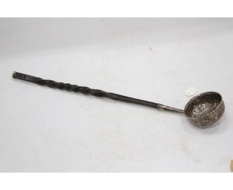 AN EARLY 19TH CENTURY SILVER PUNCH LADLE WITH INSET QUEEN ANNE SHILLING DATED 1707