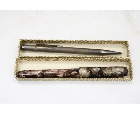 A CONWAY STEWART FOUNTAIN PEN WITH A 14CT GOLD NIB PLUS A SILVER PROPELLING PENCIL