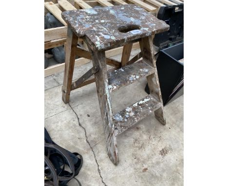A SMALL VINTAGE WOODEN TWO RUNG STEP LADDER