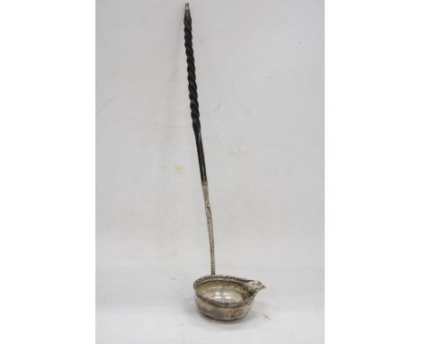 AN EARLY 19TH CENTURY HALLMARKED SILVER PUNCH LADLE