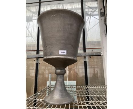 A LARGE DECORATIVE METAL URN STYLE PLANTER