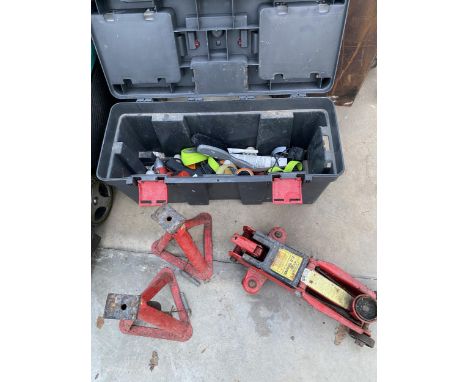 A TOOL BOX AND AN ASSORTMENT OF TOOLS TO INCLUDE A TROLLEY JACK AND TWO AXEL STANDS ETC