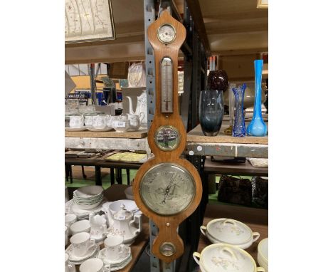 A VINTAGE MAHOGANY CASED MERCURY WHEEL BANJO BAROMETER AND THERMOMETER