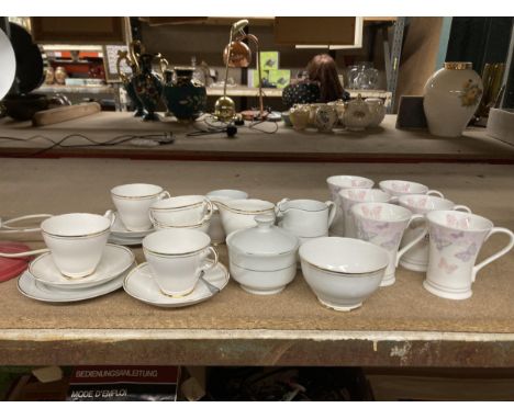 SIX LAURA ASHLEY BONE CHINA MUGS TOGETHER WITH AN ARGYLE WHITE AND GOLD RIMMED PART TEASET
