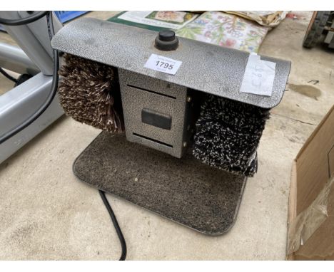 A SMALL ELECTRIC BENCH POLISHING MACHINE
