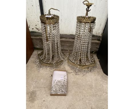 A PAIR OF VINTAGE BRASS AND GLASS DROPLET LIGHT FITTINGS