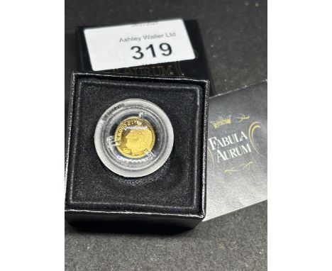 A 24 CARAT GOLD FABULA AURUN 2009 HALF CROWN PROOF COIN IN A PRESENTATION BOX