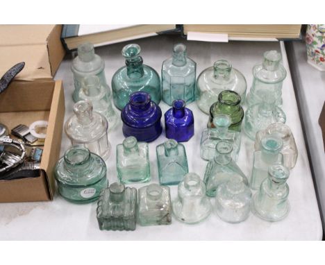 A COLLECTION OF VINTAGE GLASS BOTTLES