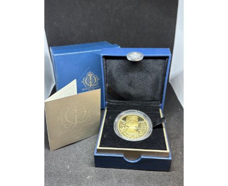 A ROYAL MINT SILVER £5 COIN PLATED WITH GOLD TO CELEBRATE THE QUEENS DIAMOND JUBILEE IN A PRESENTATION BOX WITH SLEEVE