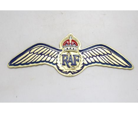 A GOLD COLOURED RAF ALLOY WALL PLAQUE