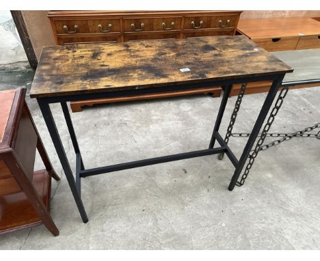 A CONSOLE TABLE ON METAL LEGS, 40" WIDE.