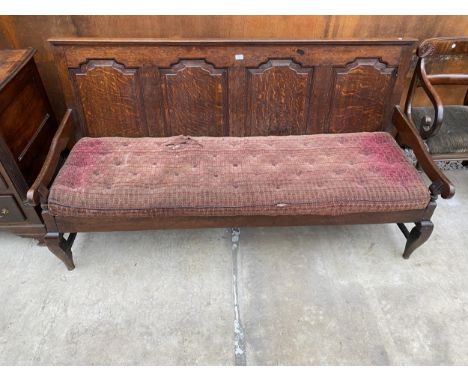 A GEORGE III OAK SETTLE WITH FOUR PANEL BACK, 72" WIDE