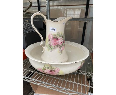 A LARGE FLORAL CERAMIC JUG AND WASH BOWL