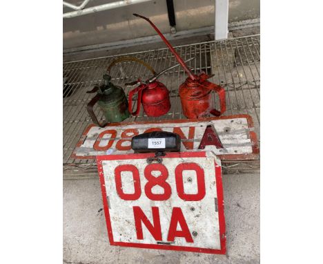 A SET OF VINTAGE NUMBER PLATES AND THREE PUMP ACTION OIL CANS