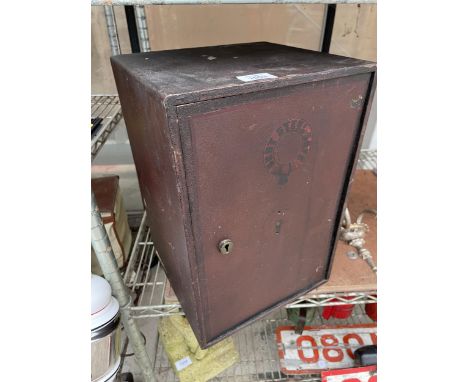 A SMALL VINTAGE BENT STEEL SAFE COMPLETE WITH KEY (26CM x 28CM x 41CM) (KEY IN OFFICE)