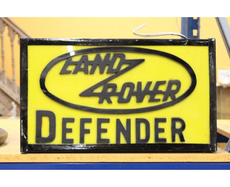 A LAND ROVER DEFENDER ILLUMINATED LIGHT BOX SIGN - 47 CM (L) 27.5 CM (H) 10 CM (D)