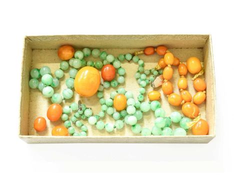 A Jade Two Row Bead Necklace, length 39cm, and An Amber Bead Necklace (a.f.)Jade necklace - in fair condition however we cann