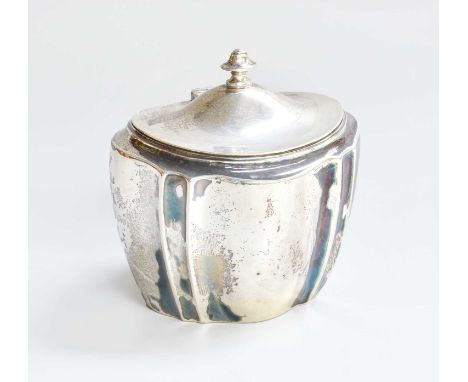 A Victorian Silver Tea-Caddy, by William Gibson and John Lawrence Langman, London, 1899, tapering fluted oval, the hinged cov