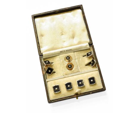 An Onyx and Split Pearl Dress Stud, Button and Cufflink Suite, comprising of two dress studs, four buttons and a pair of chai