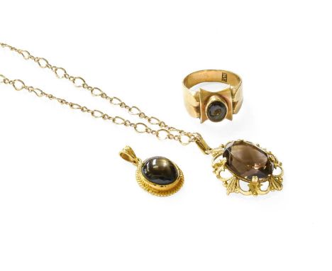 A 9 Carat Gold Smoky Quartz Pendant on Chain, pendant length 3.5cm, chain length 46.7cm; A Star Stone Ring, stamped '14K', fi