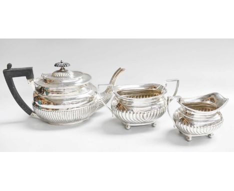 A Three-Piece Assembled Victorian and George V Silver Tea-Service, The Teapot by William Wheatcroft Harrison, Sheffield, Circ