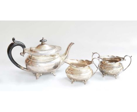 A Three-Piece George V Silver Tea-Service, by Stewart Dawson and Co., Chester, 1915, each piece tapering oval and on panel fe