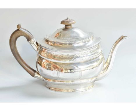 A George III Silver Teapot, by Robert and David Hennell, London, 1800, tapering oval, the rim engraved with foliage and flowe