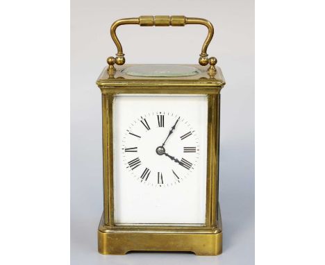 A Brass Striking Carriage Clock, circa 1900, 17.5cm high over handleThe case surfaces are discoloured, back door bottom hinge