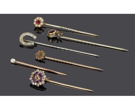 Stick pins, to include a horse shoe example, star and flower head examples and a pearl head example, (6)