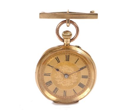Ladies 18 carat gold open face pocket watch, the gilt dial with foliate decoration and Roman numerals, the engine turned case