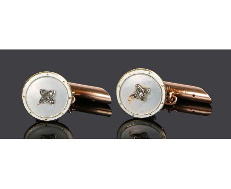 Pair of 9 carat gold enamel and diamond set cufflinks, each with a disc with central diamond design, a mother of pearl back a