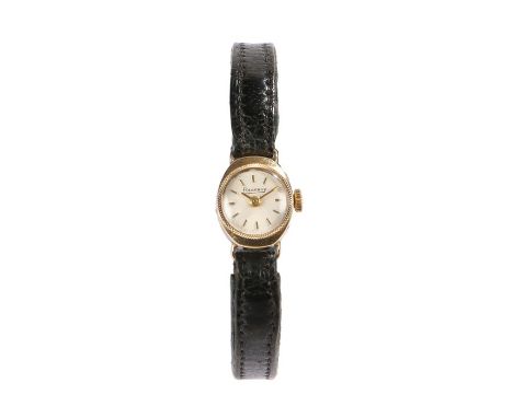 Regency 9 carat gold ladies wristwatch, the signed white dial with gilt baton numerals, manual wound, the case 13mm wide