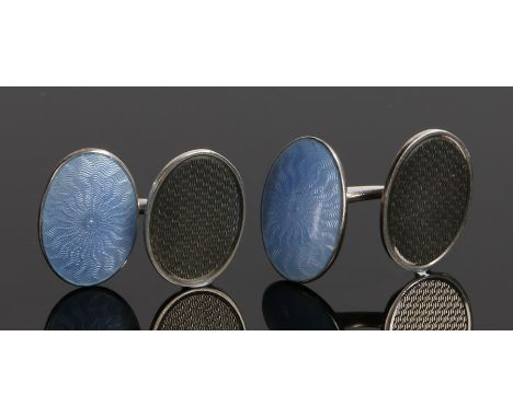 Pair of silver and guilloche enamel cufflinks, with oval discs, one of each in pale blue guilloche enamel