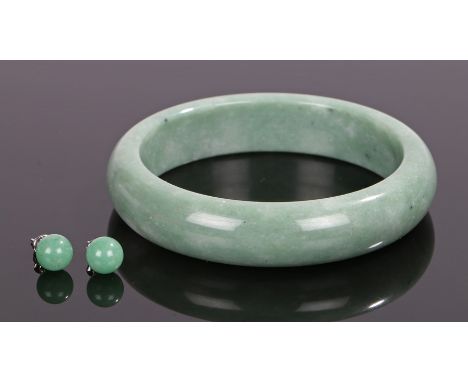 Jade jewellery, to include a jade bangle and a pair of jade ear studs