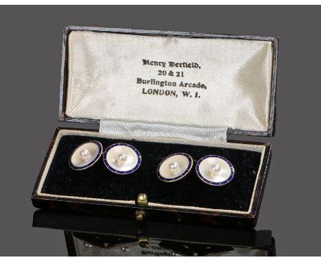 Pair of 18 carat gold pearl and enamel cufflinks each disc with a central pearl a mother of pearl back and a blue enamel edge