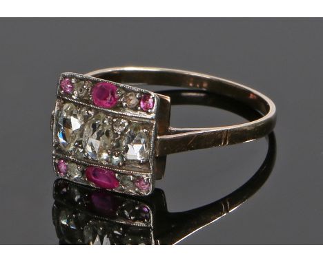 19th Century diamond and ruby set ring, with eleven diamonds and six rubies to the square head, ring size S 1/2