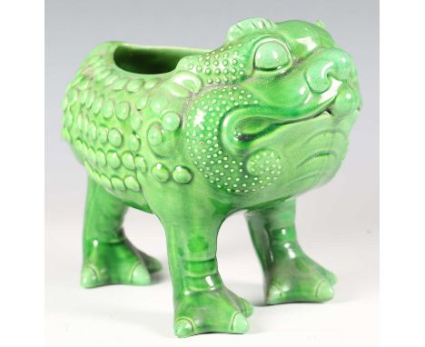 A Mintons green glazed pottery vase, modelled in the form of a grotesque three-legged toad, impressed maker's stamp to unders