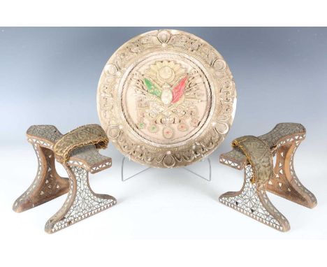 A pair of late 19th century Turkish walnut and mother-of-pearl inlaid bath clogs with gilt thread embroidered leather straps 