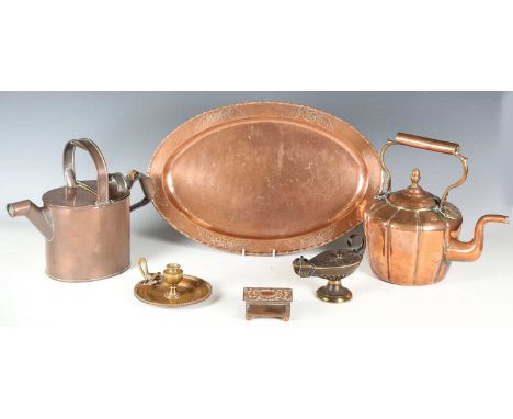 A small group of copper wares and metalwork, including an early 20th century cast bronze model of a Roman oil lamp, length 15