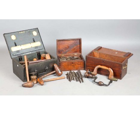 A large collection of early 20th century and later wood and metal working tools, including lead mallets, chisels, drills, bit