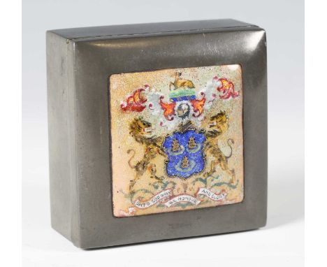 An early 20th century Liberty &amp; Co 'Tudric' pewter square box, the hinged lid with an enamelled heraldic crest for the Wo