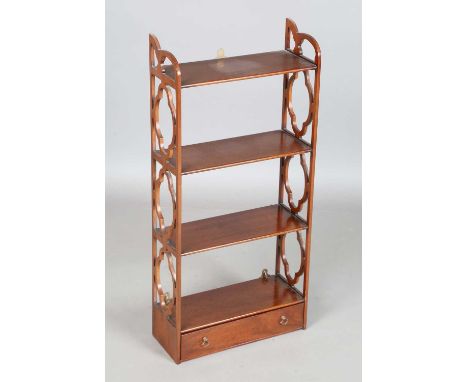 A 20th century reproduction mahogany four-tier wall shelf with fretwork sides and single drawer, height 87cm, width 41cm, dep