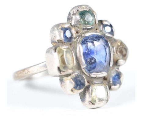 An early 20th century Arts and Crafts silver, sapphire and coloured gem set ring, attributed to Sybil Dunlop, unmarked, width