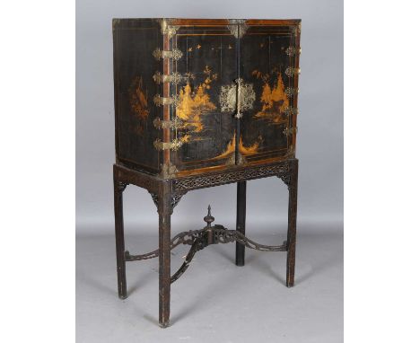 An 18th century Chinese export lacquer collector's cabinet, later converted to a drinks cabinet and raised on a later pierced