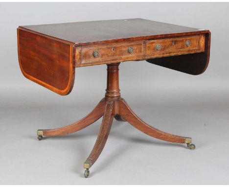 A Regency mahogany sofa table with a crossbanded top and two opposing frieze drawers, height 73cm, extended width 144cm, dept